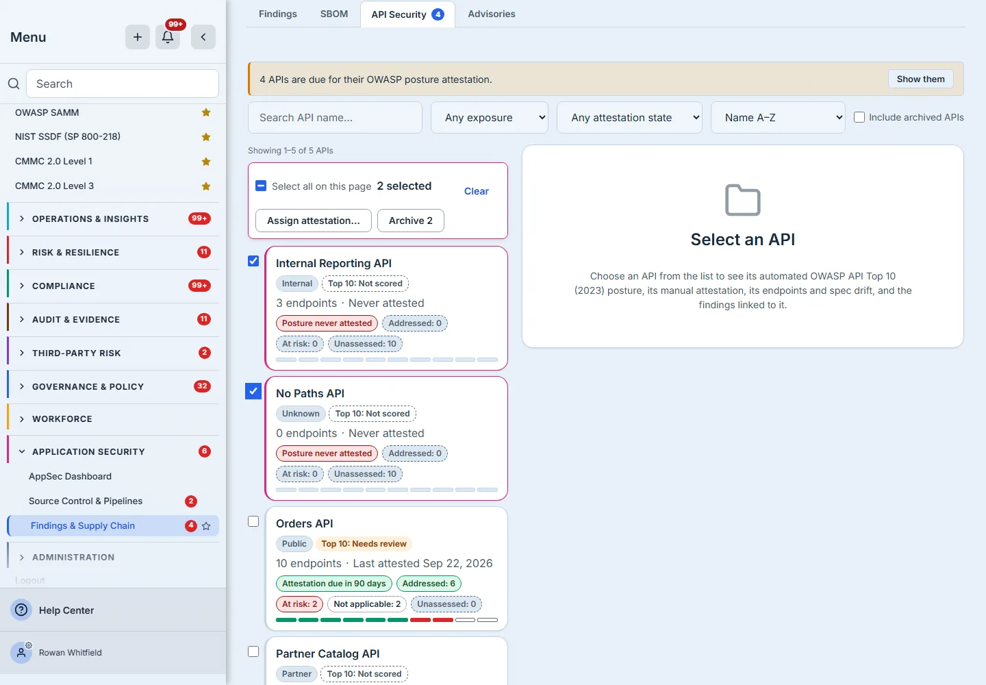 The register with two rows selected: the bulk action bar reporting "2 selected" with a Clear action and the verbs the selection can actually take — Assign attestation and Archive 2 — above the list it will act on, where the two chosen APIs carry a selected outline and every row shows its exposure chip, Top 10 grade chip, endpoint count, last-attested line, posture chips and ten-cell OWASP coverage bar.