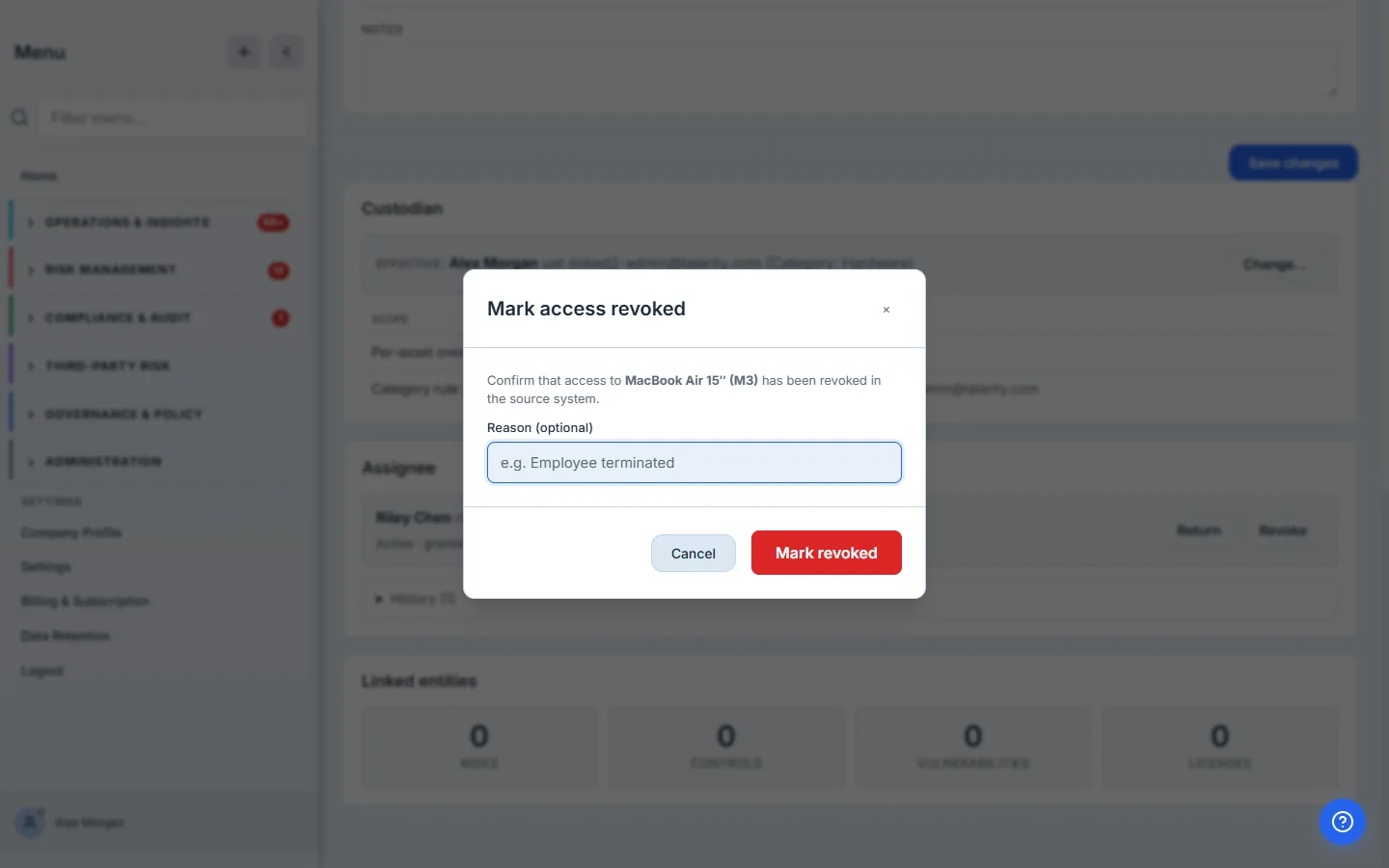 The Revoke-access modal — a reason field, confirming access was cut in the source system.