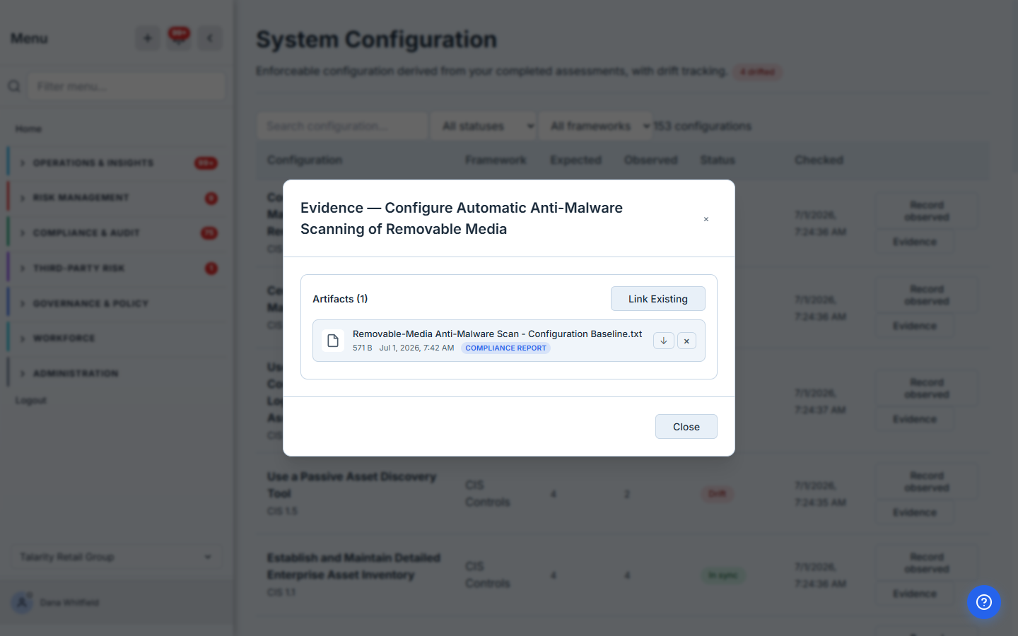 The Evidence dialog for the anti-malware scanning control, showing one linked artifact ("Removable-Media Anti-Malware Scan - Configuration Baseline.txt") with its size, date, and a "Compliance Report" type badge, plus a "Link Existing" action.